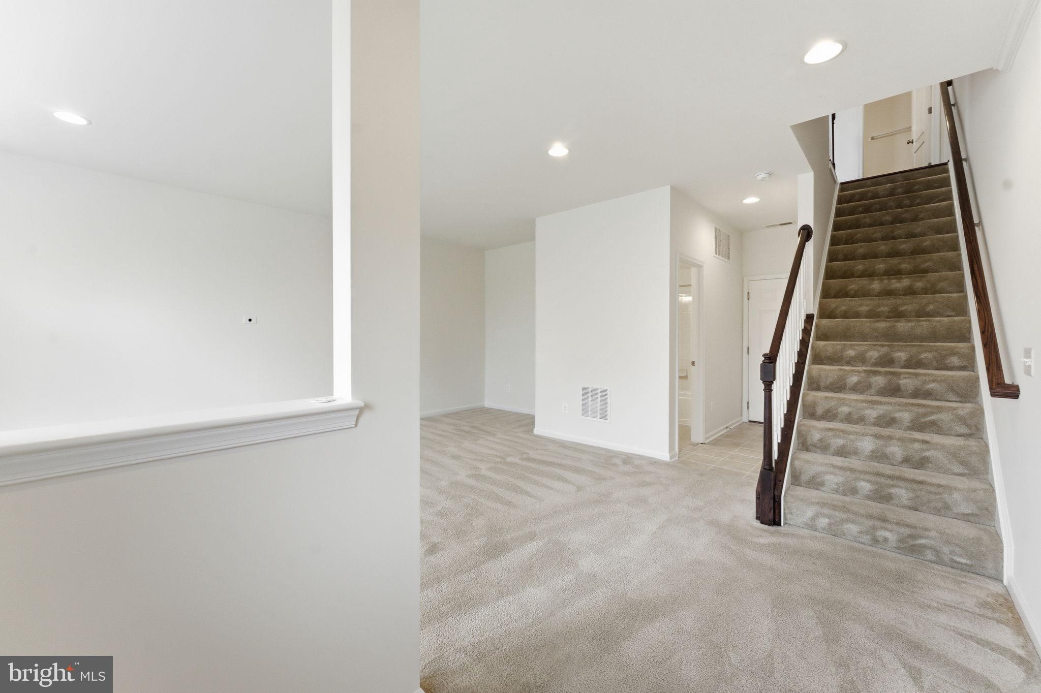 42396 Benfold Square Brambleton, VA 20148 - Photo 57 of 65 wooden floor in an empty room with wooden floor