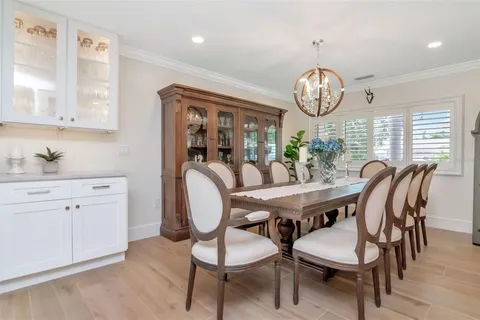 a living room with furniture and a lamp