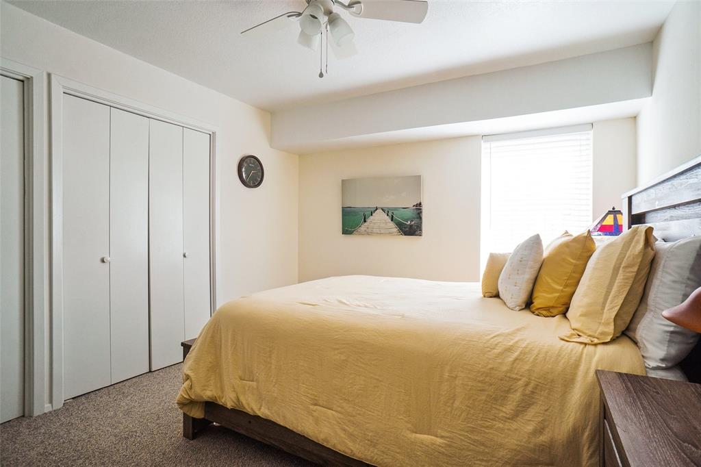 388 Driftwood Court, Unit 1A Azle, TX 76020 - Photo 19 of 29 Third Bedroom with a sunlit window facing path to the front door