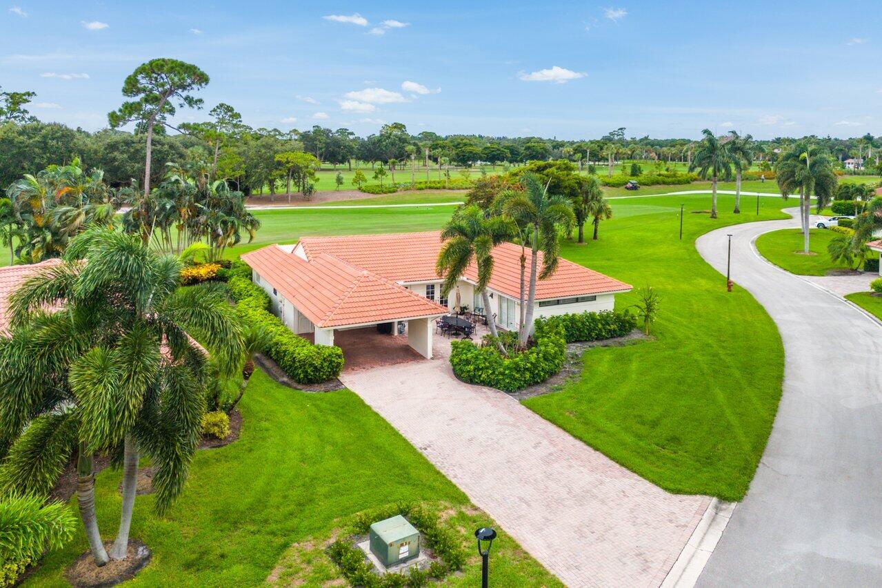 4024 Shelldrake Lane, Unit SHELLDRAKE Boynton Beach, FL 33436 - Photo 1 of 51 an aerial view of a house with yard swimming pool and outdoor seating