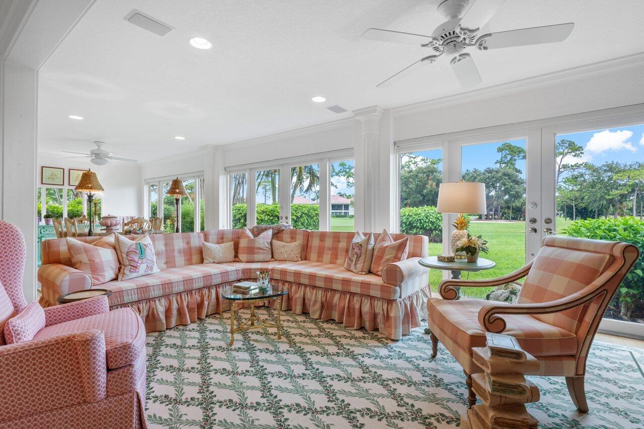 4024 Shelldrake Lane, Unit SHELLDRAKE Boynton Beach, FL 33436 - Photo 13 of 51 a living room with fireplace furniture and a large window