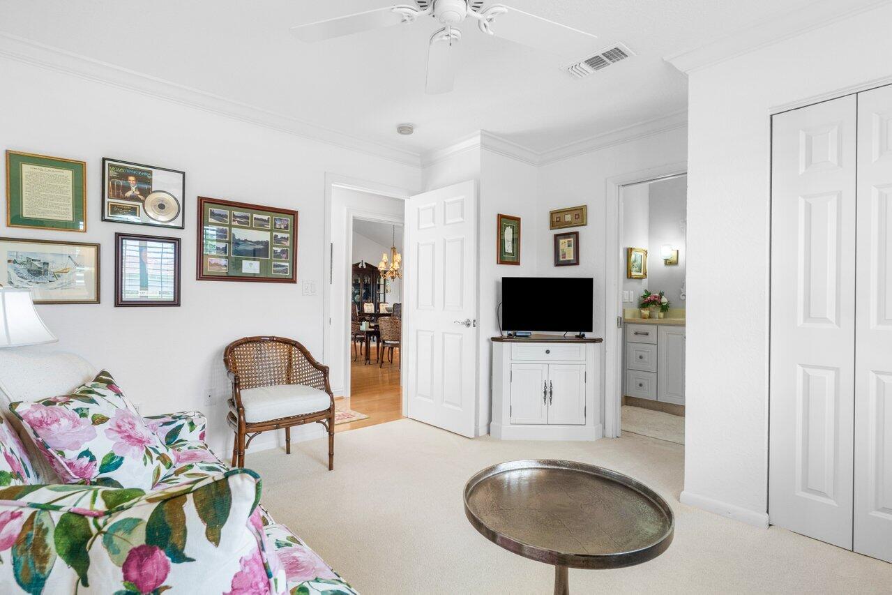 4024 Shelldrake Lane, Unit SHELLDRAKE Boynton Beach, FL 33436 - Photo 25 of 51 a living room with furniture and a flat screen tv