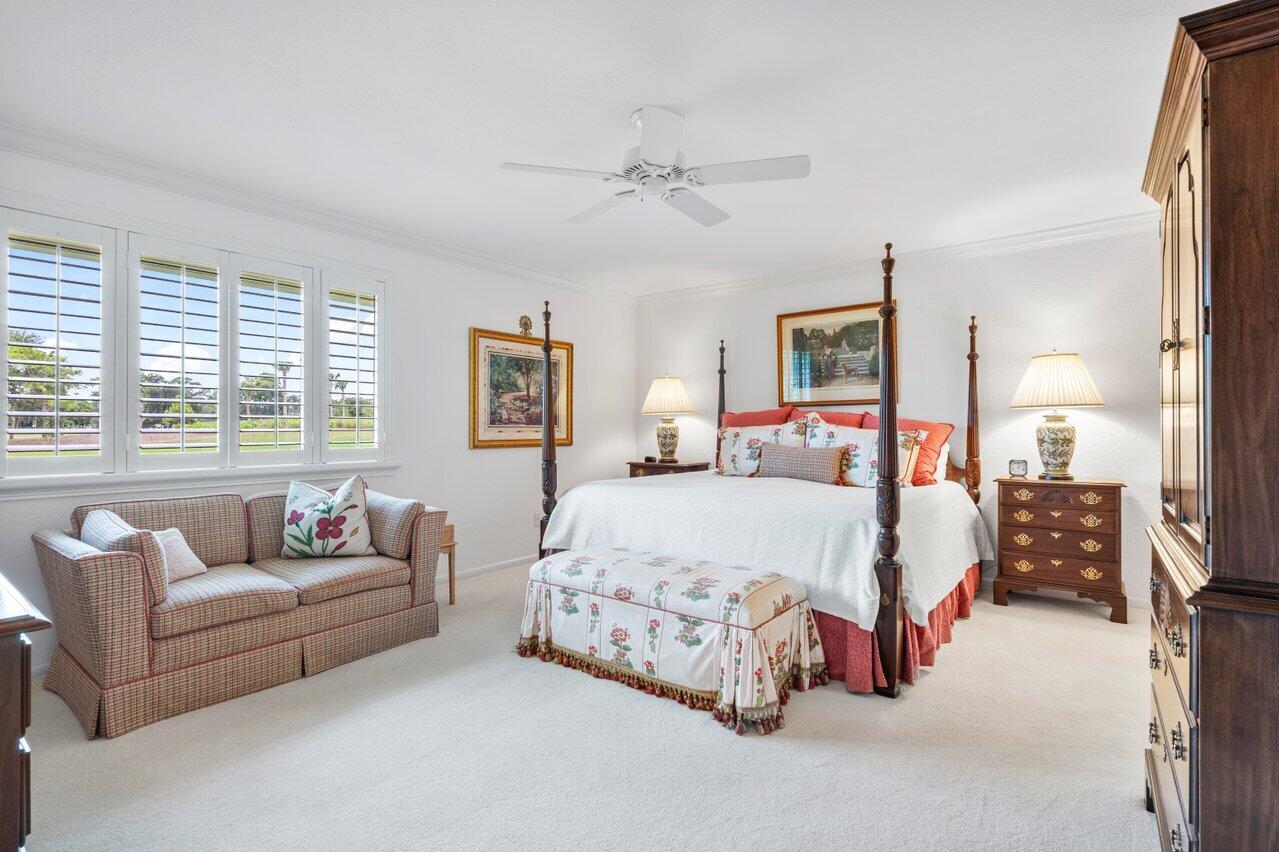 4024 Shelldrake Lane, Unit SHELLDRAKE Boynton Beach, FL 33436 - Photo 28 of 51 a bedroom with bed and a couch