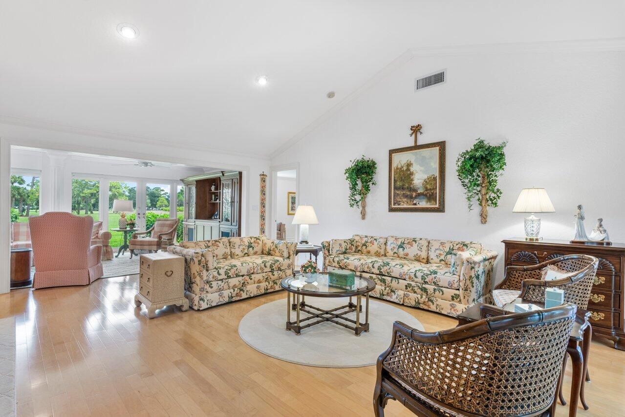 4024 Shelldrake Lane, Unit SHELLDRAKE Boynton Beach, FL 33436 - Photo 8 of 51 a living room with furniture and a large window