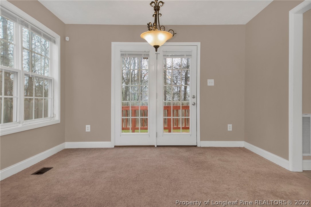 1623 Silver Ridge Court Fayetteville, NC 28304 - Photo 11 of 34 a view of an empty room with a window