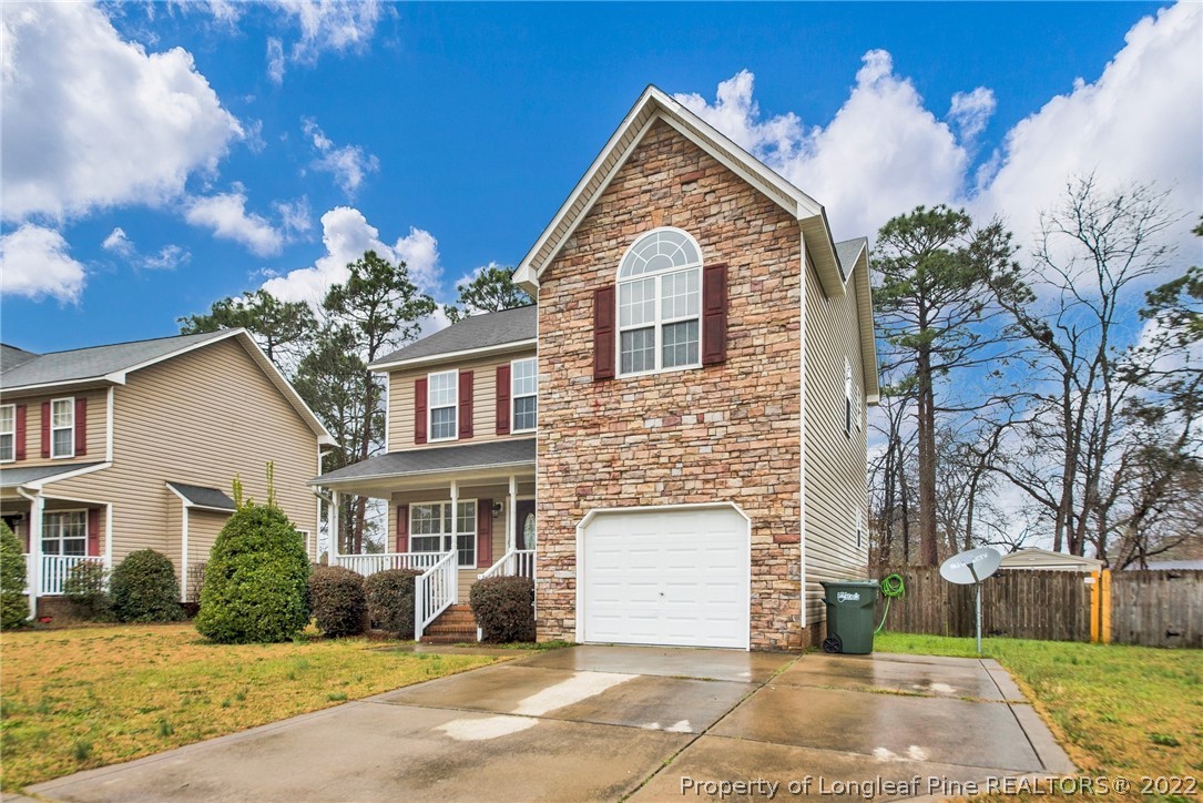 1623 Silver Ridge Court Fayetteville, NC 28304 - Photo 2 of 34 a view of a white house with a yard