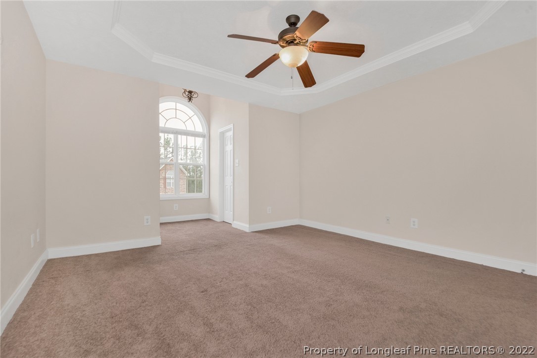 1623 Silver Ridge Court Fayetteville, NC 28304 - Photo 27 of 34 an empty room with windows and fan
