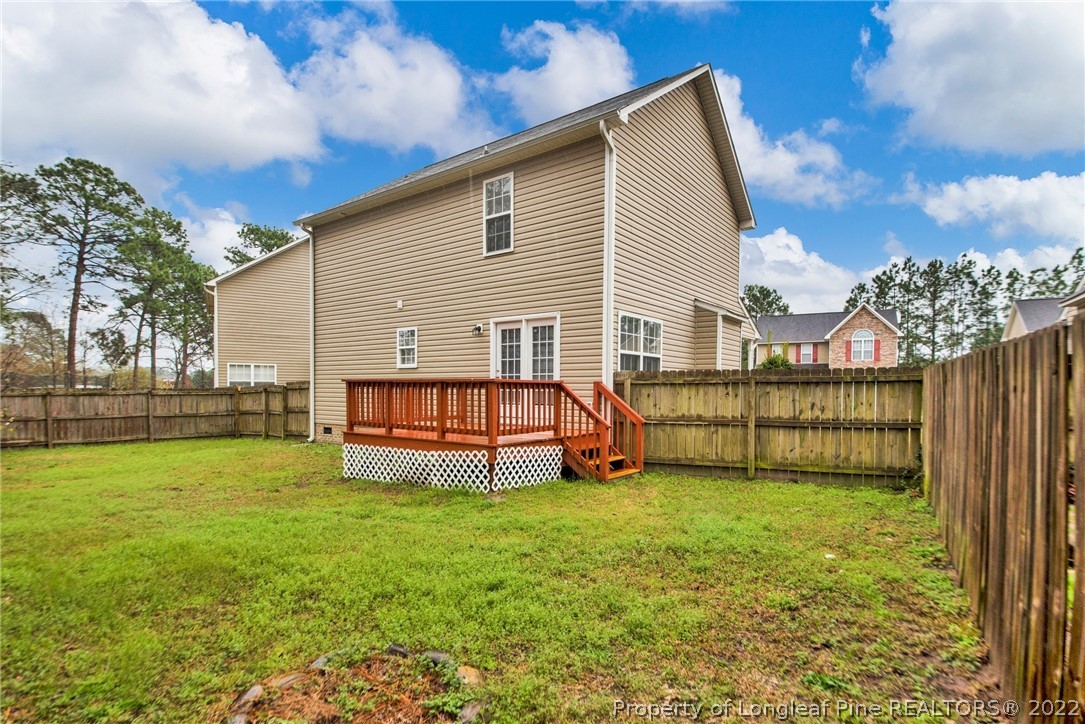 1623 Silver Ridge Court Fayetteville, NC 28304 - Photo 30 of 34 a view of a house with backyard and porch