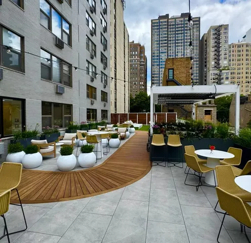 a view of a city with patio