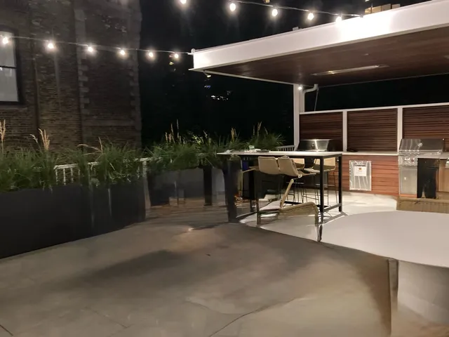 a view of a lobby with furniture and potted plants