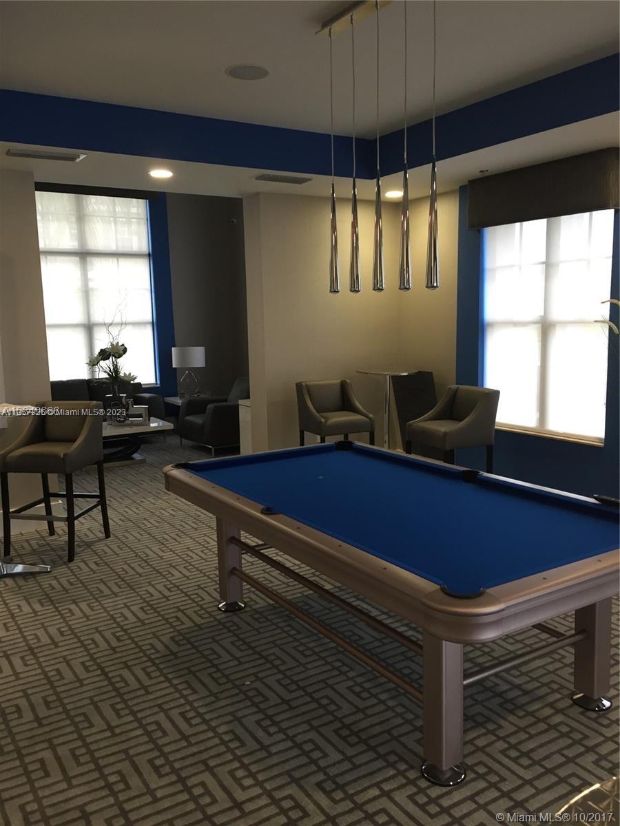 Kendall Commons Miami, FL 33196 - Photo 26 of 37 a living room with furniture and a window