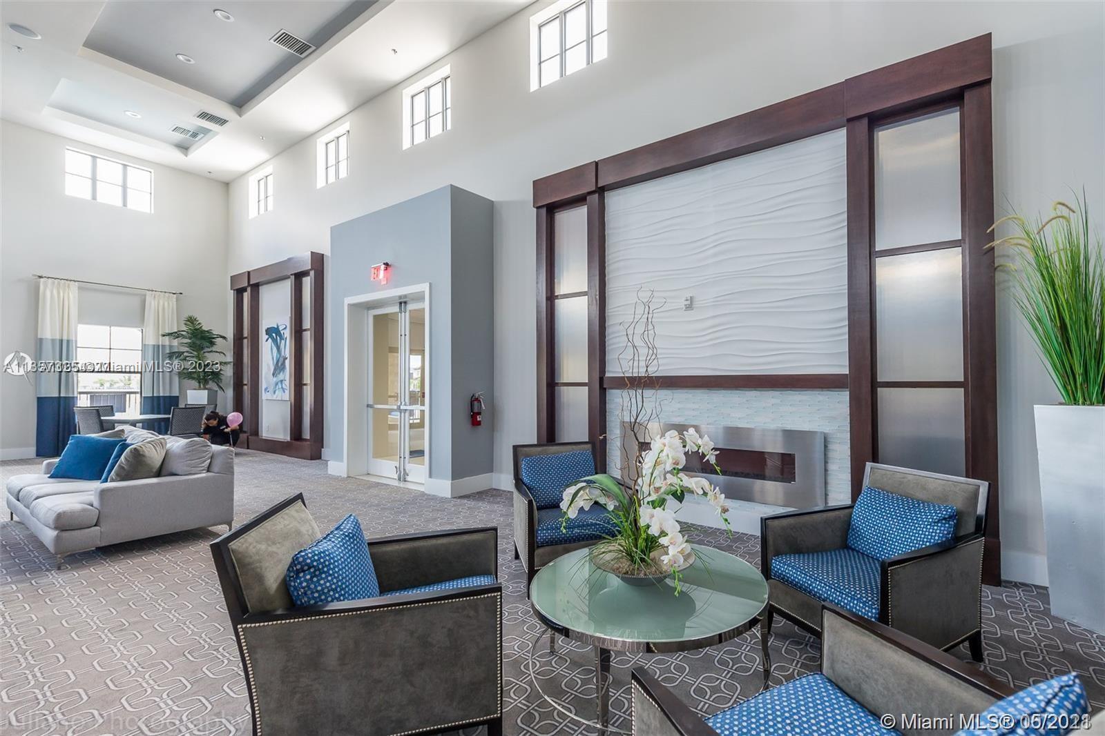 Kendall Commons Miami, FL 33196 - Photo 10 of 37 a living room with furniture and a potted plant