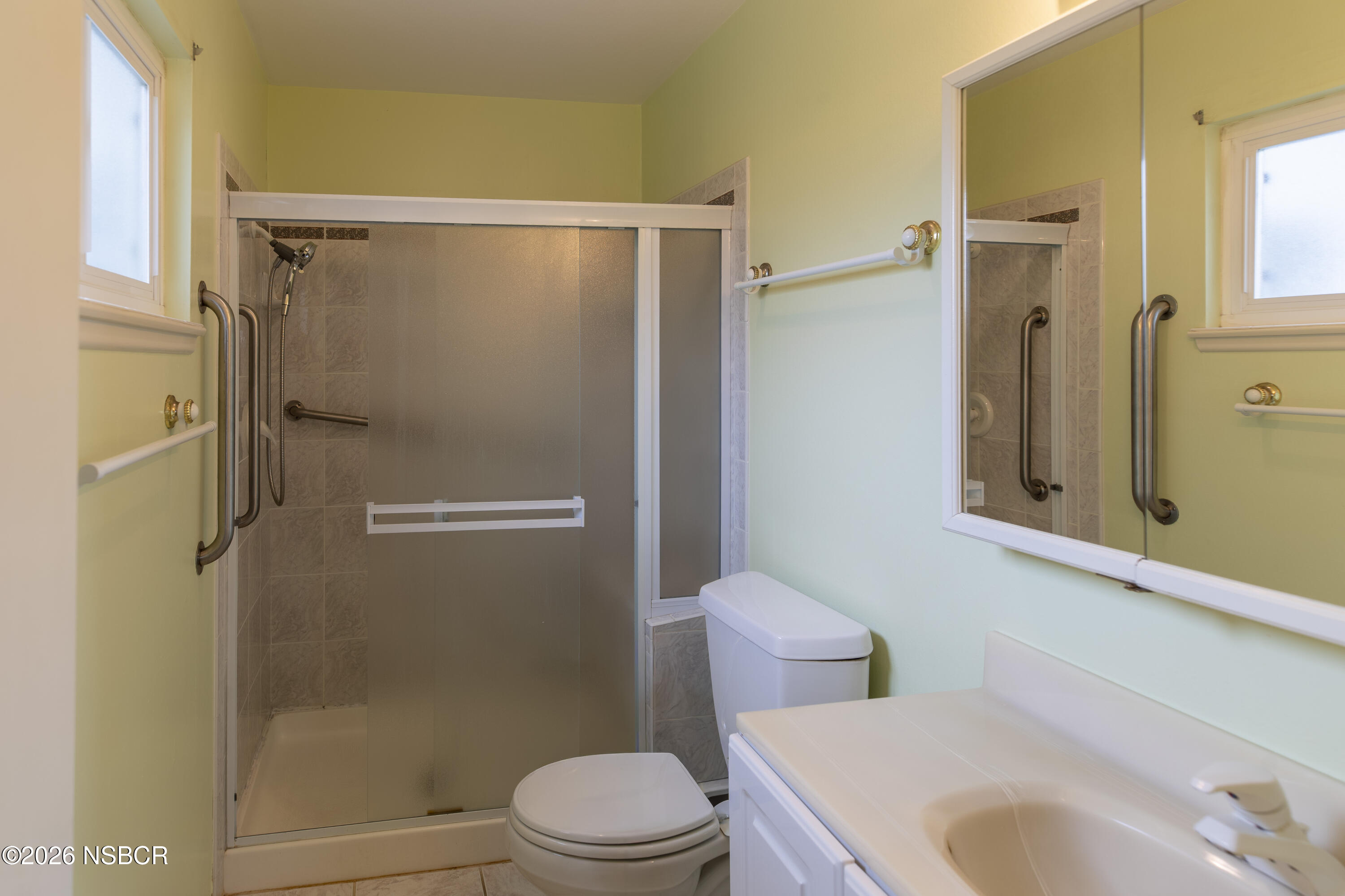 124 Princeton Place Lompoc, CA 93436 - Photo 24 of 41 a bathroom with a sink toilet and shower