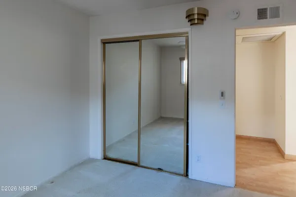 an empty room and closet