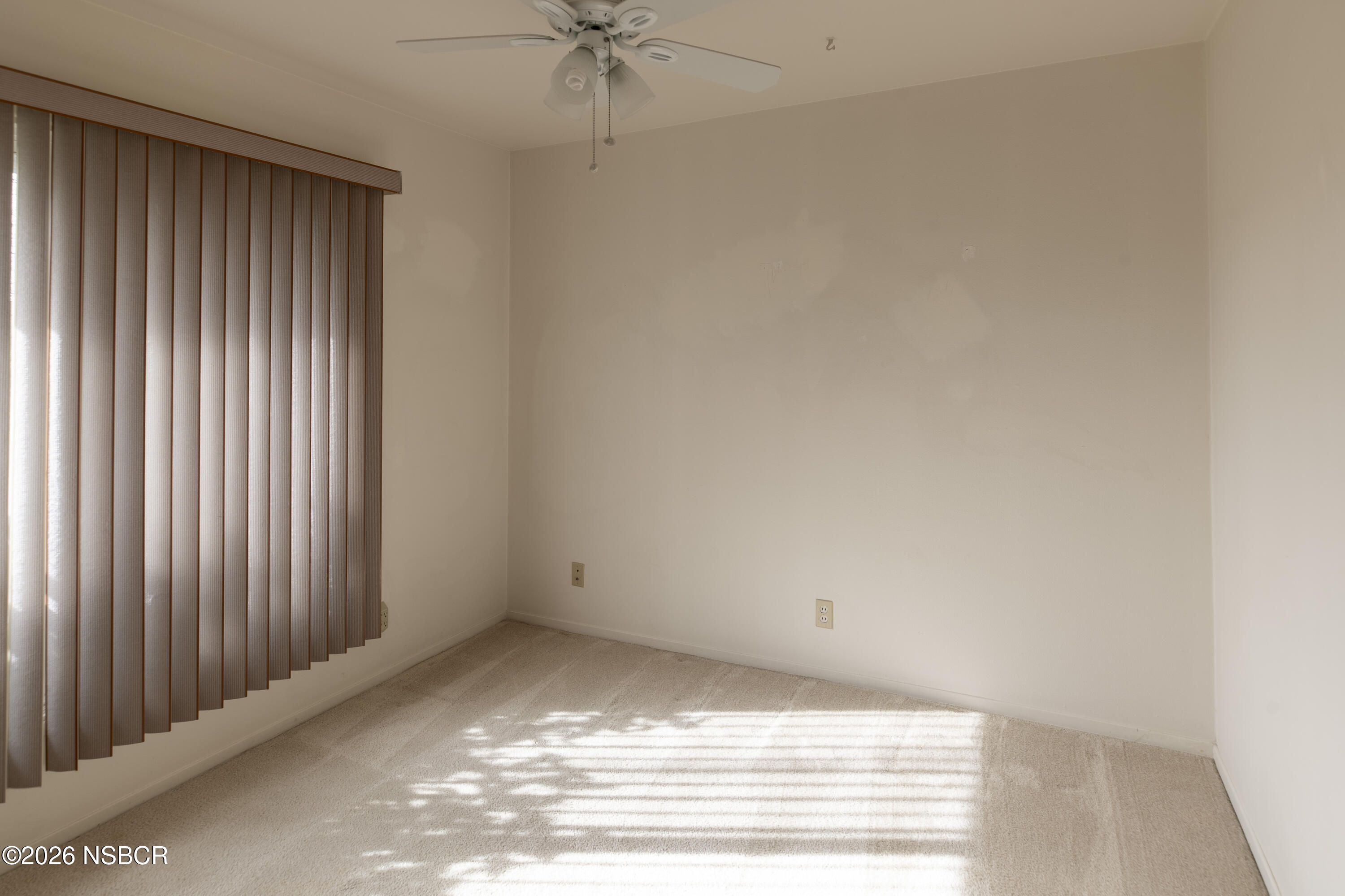 124 Princeton Place Lompoc, CA 93436 - Photo 27 of 41 a view of a small space with wooden floor and a window