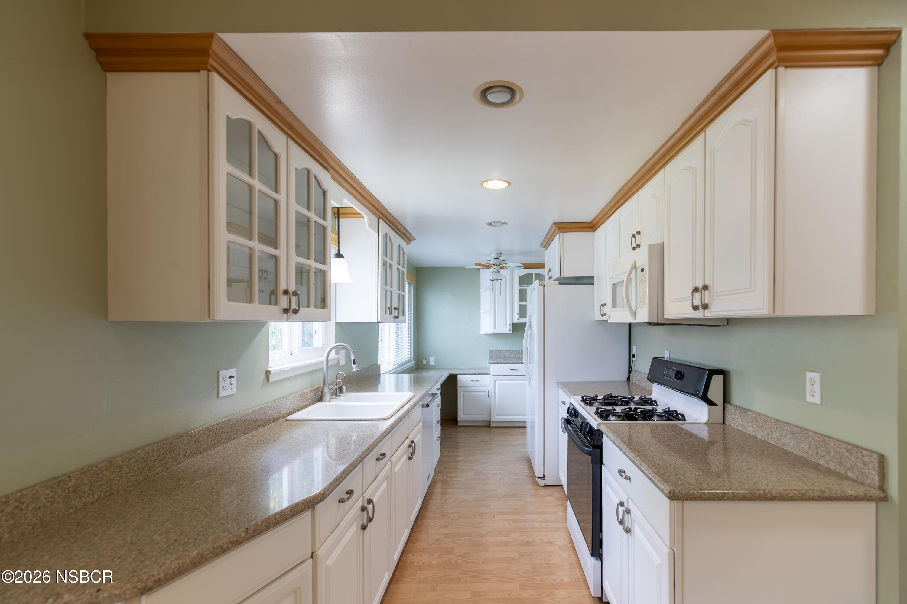 124 Princeton Place Lompoc, CA 93436 - Photo 8 of 41 a kitchen with stainless steel appliances granite countertop a sink stove and refrigerator