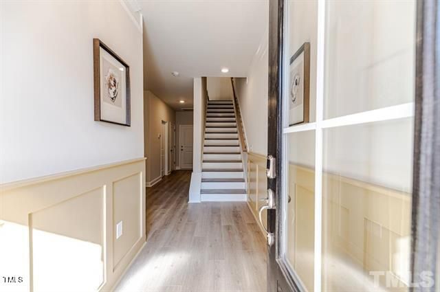 a view of a hallway with staircase