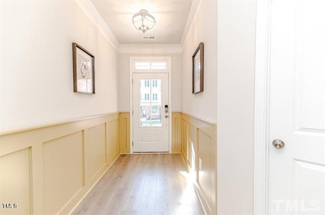 a view of a hallway with a white walls