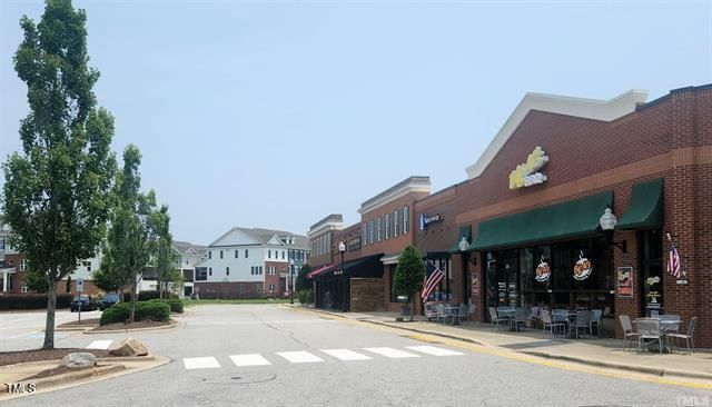 a view of street with shops