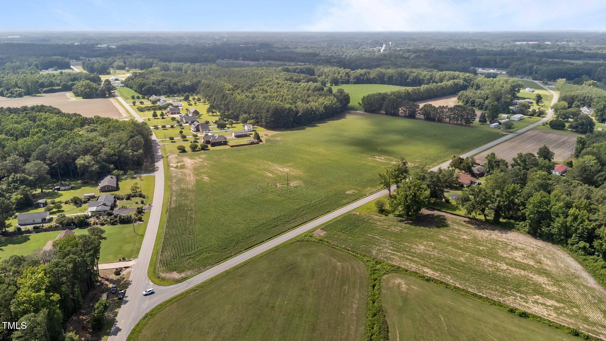 1299 Piney Grove Church Road Kenly, NC 27542 - Photo 2 of 9 a view of an ocean from a balcony