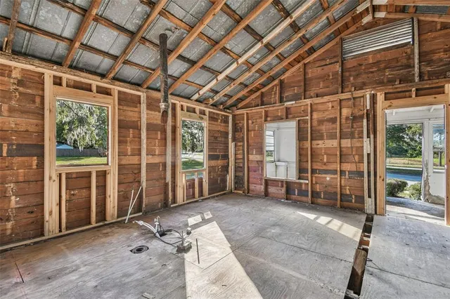 a view of front door with outdoor seating