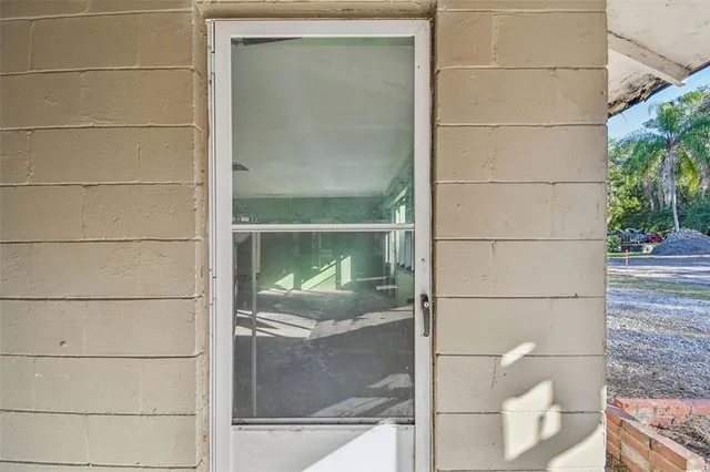 a view of a big room with windows