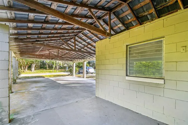 a view of a room with wooden walls