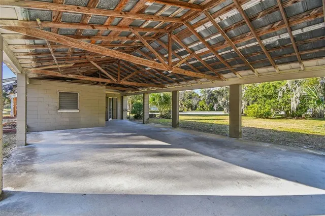 a view of a big room with wooden walls