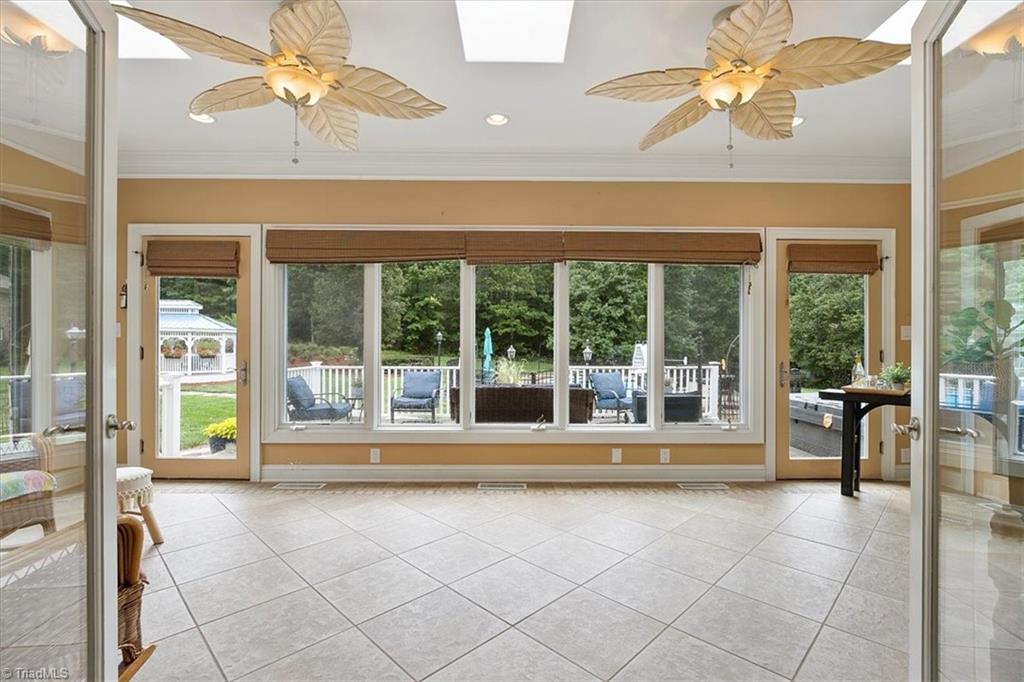 1638 Sapling Way Randleman, NC 27317 - Photo 19 of 47 HUGE Sun room overlooks the back yard!