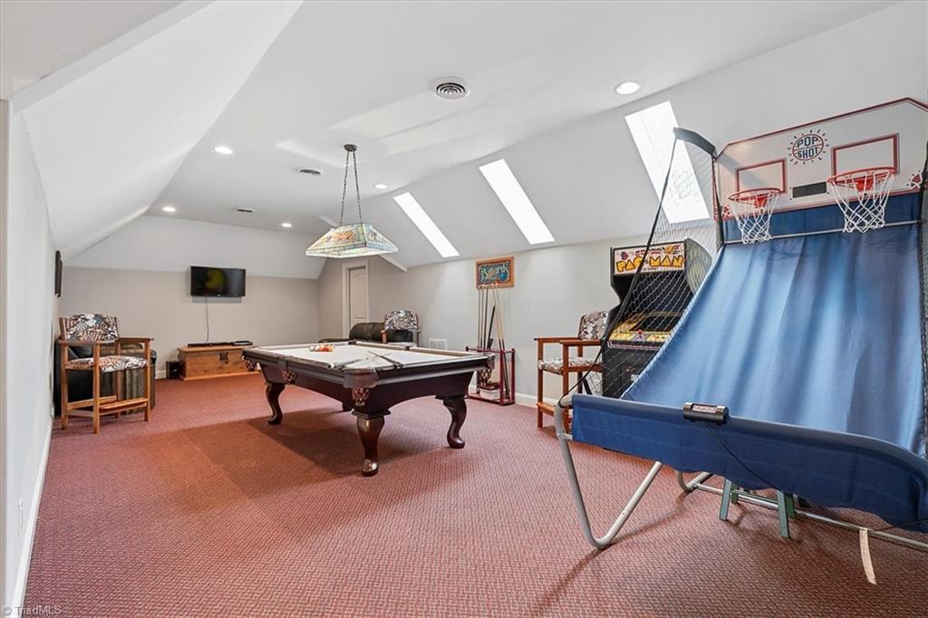 1638 Sapling Way Randleman, NC 27317 - Photo 34 of 47 HUGE upstairs Playroom/activity room currently being utilized as a bedroom, private bath in distant right