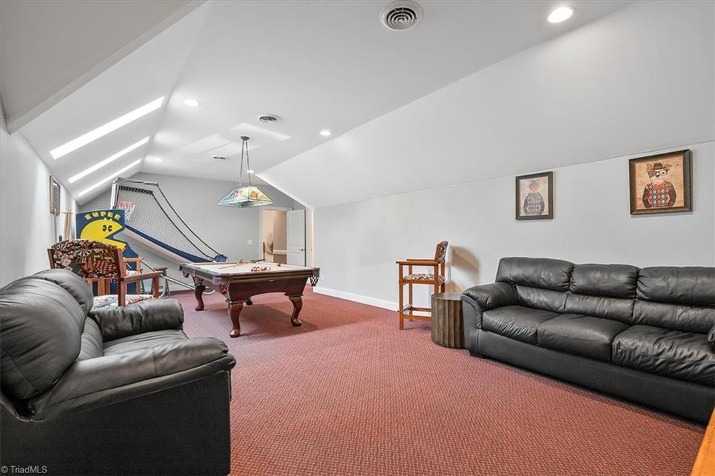 1638 Sapling Way Randleman, NC 27317 - Photo 35 of 47 WOW! Game room Galore! Lots of light from the skylights!