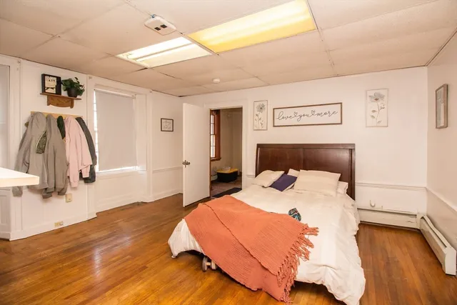 a bedroom with a bed and a walk in closet