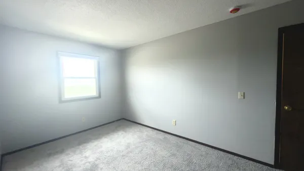 an empty room with a window