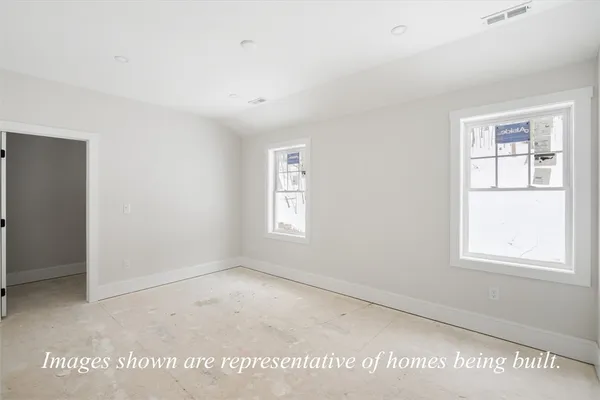 an empty room with windows