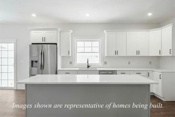 a view of a kitchen with a sink