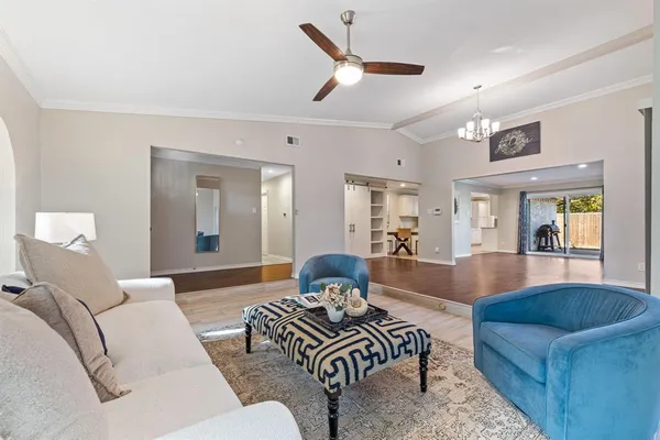 a living room with furniture and a couch