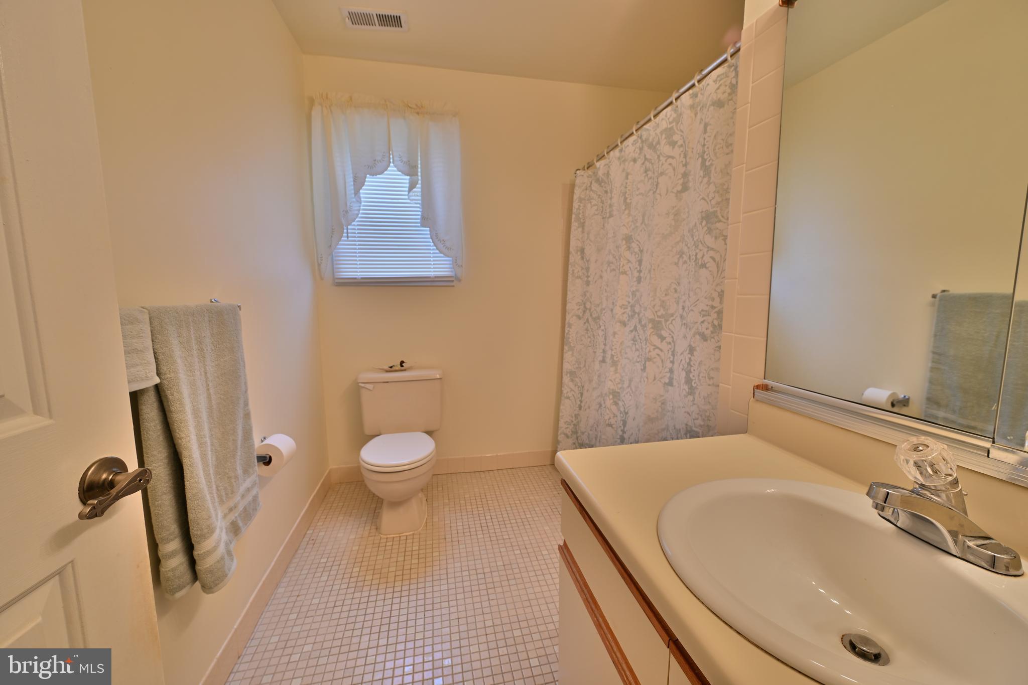 12 Windmill Court Columbus, NJ 08022 - Photo 11 of 51 a bathroom with a sink a toilet and a mirror