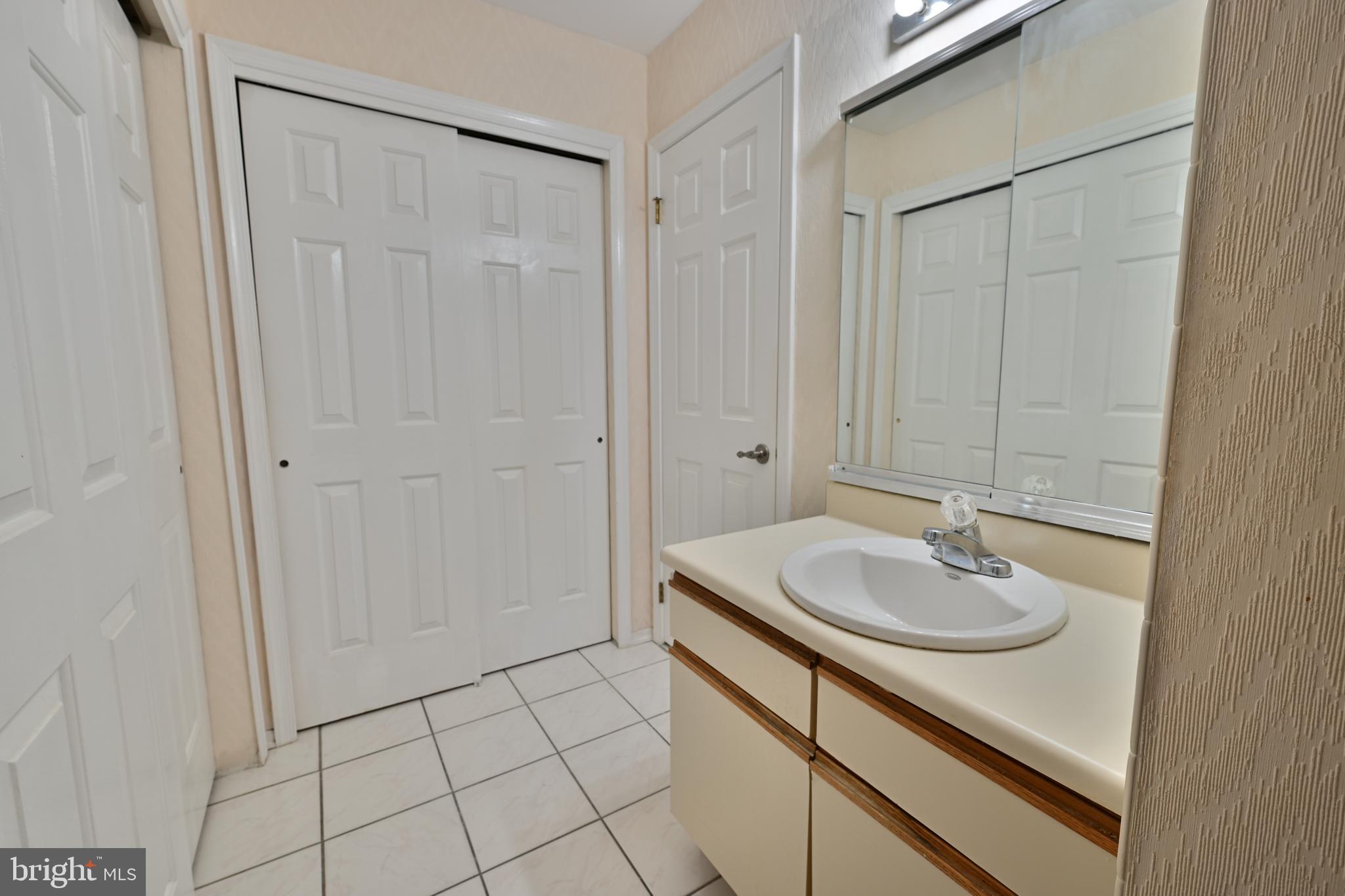 12 Windmill Court Columbus, NJ 08022 - Photo 15 of 51 a bathroom with a sink and a mirror