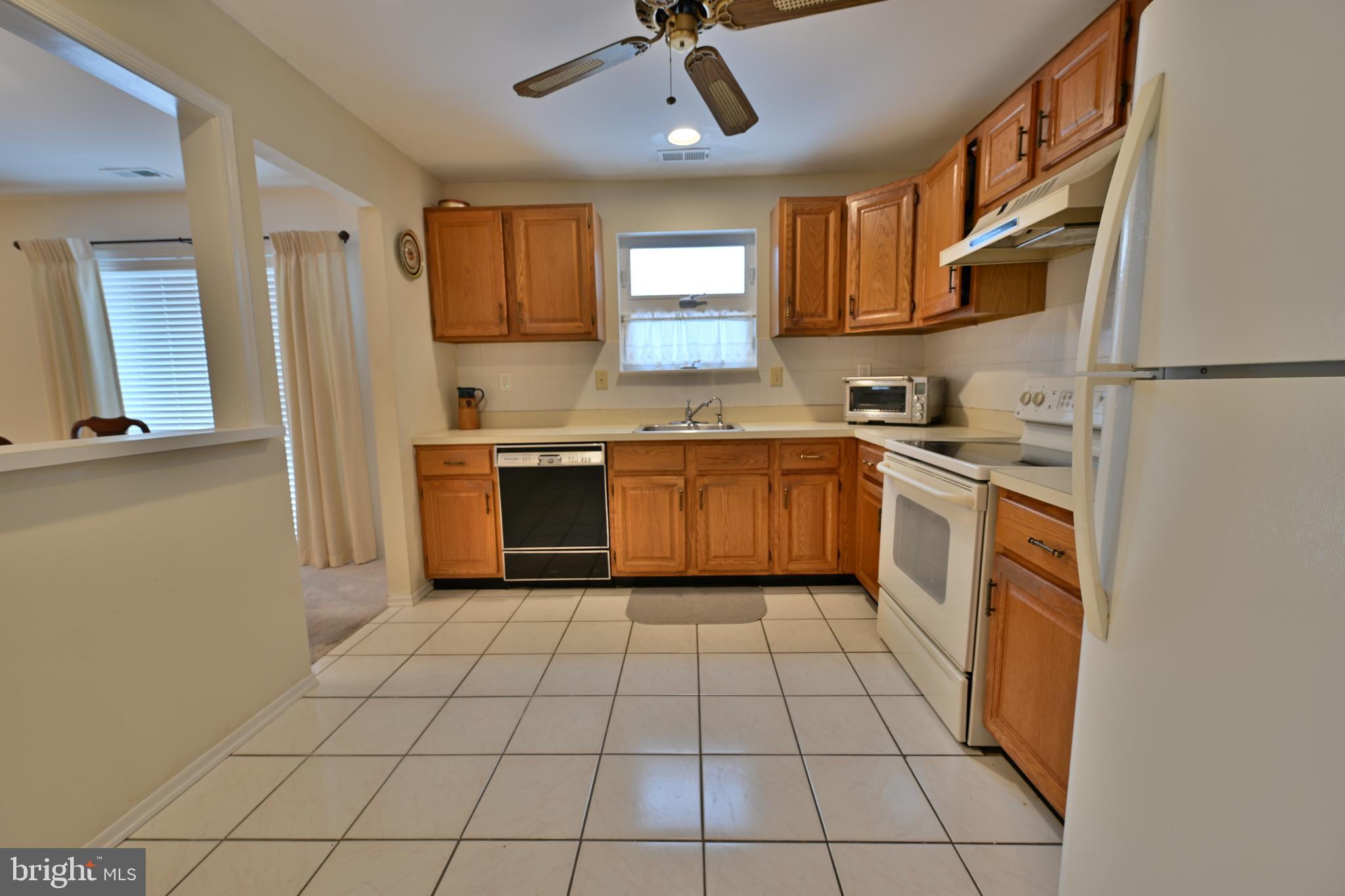 12 Windmill Court Columbus, NJ 08022 - Photo 2 of 51 a kitchen with stainless steel appliances granite countertop a stove sink and cabinets