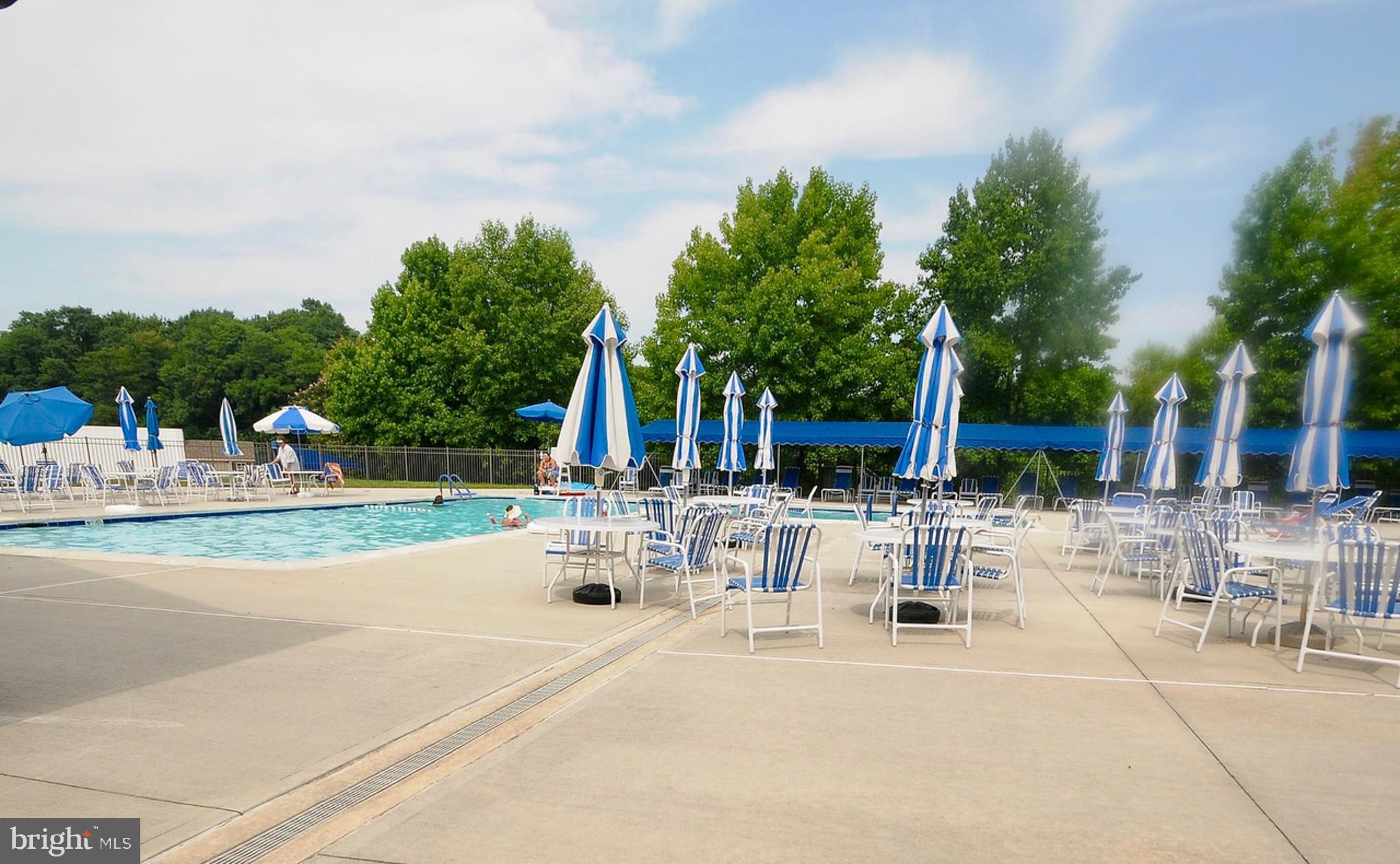 12 Windmill Court Columbus, NJ 08022 - Photo 36 of 51 a view of a swimming pool with outdoor seating