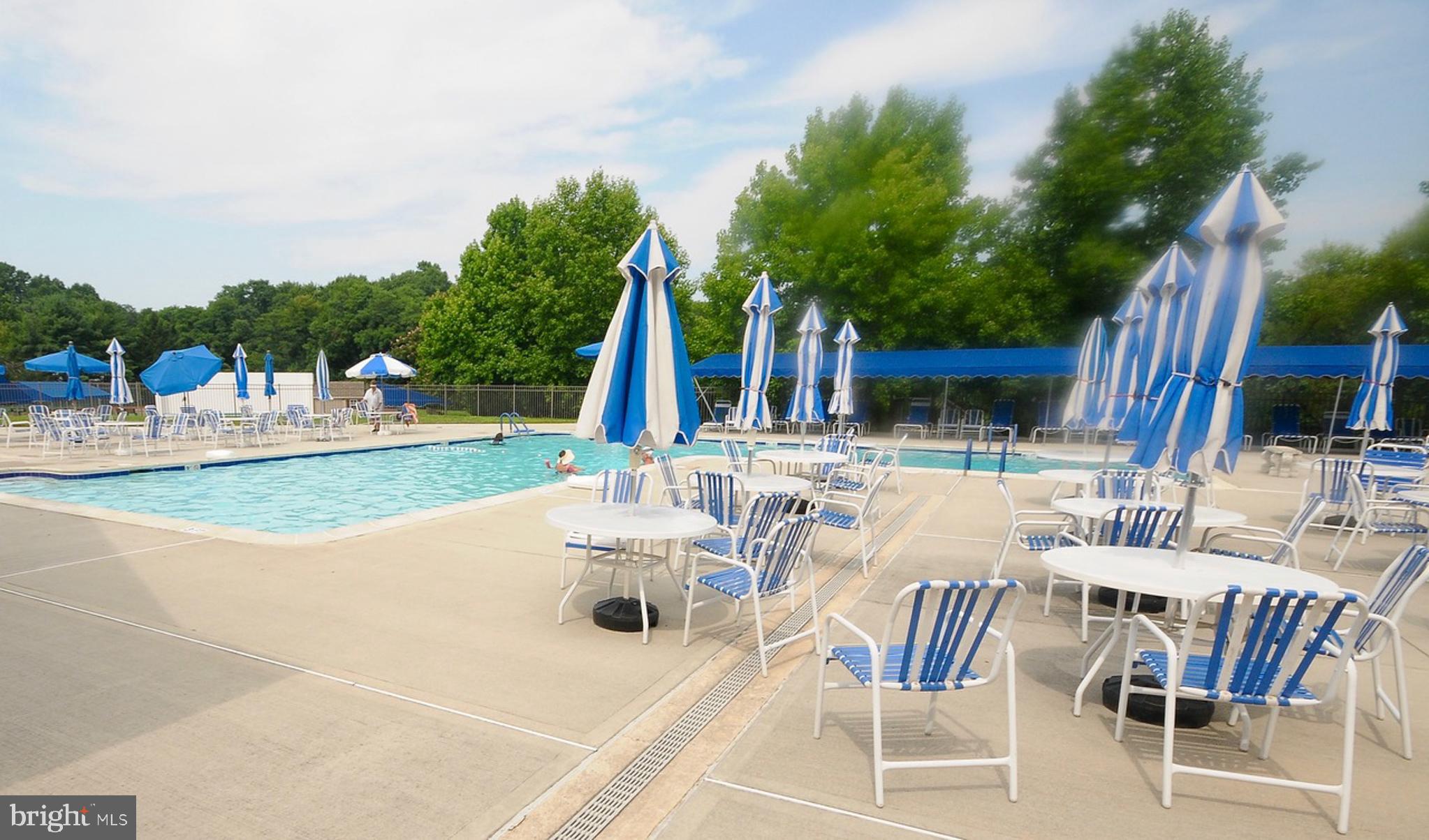 12 Windmill Court Columbus, NJ 08022 - Photo 37 of 51 a view of a swimming pool with outdoor seating and plants