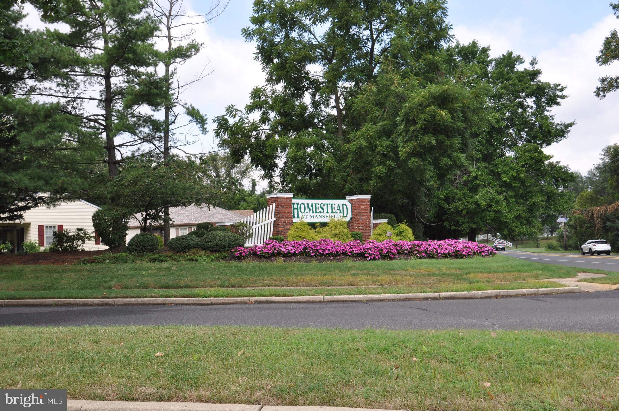 12 Windmill Court Columbus, NJ 08022 - Photo 45 of 51 a sign that is sitting in the middle of a field
