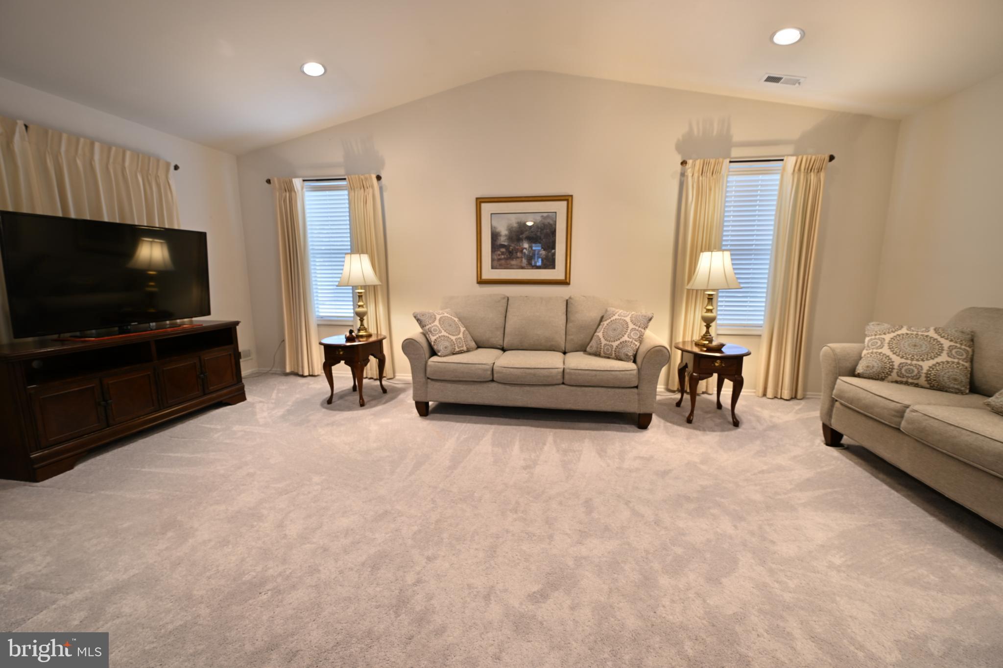 12 Windmill Court Columbus, NJ 08022 - Photo 5 of 51 a living room with furniture and a flat screen tv