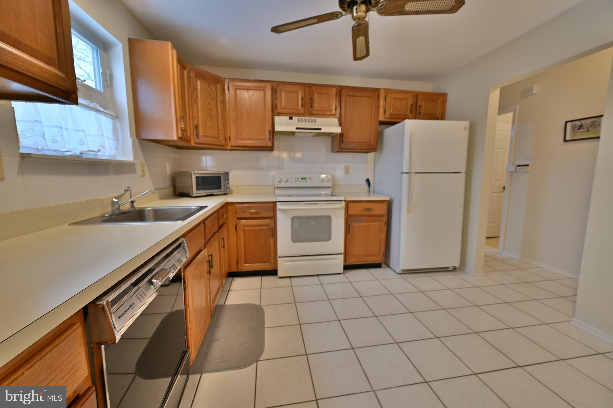 12 Windmill Court Columbus, NJ 08022 - Photo 6 of 51 a kitchen with stainless steel appliances cabinets a sink and a stove top oven
