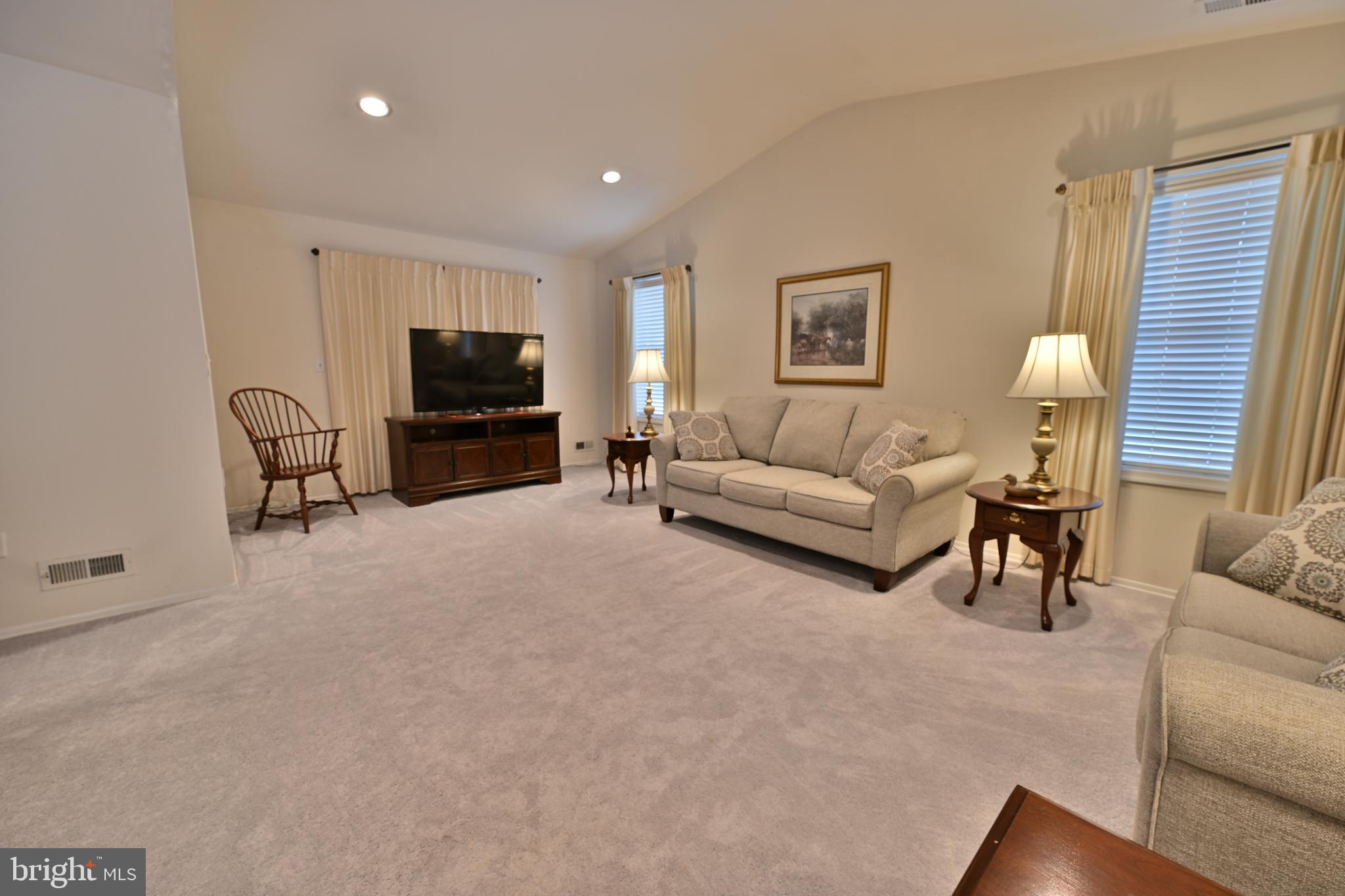 12 Windmill Court Columbus, NJ 08022 - Photo 8 of 51 a living room with furniture and a flat screen tv