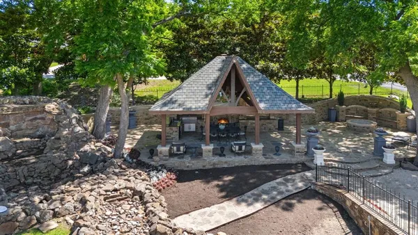 a aerial view of a house with a yard