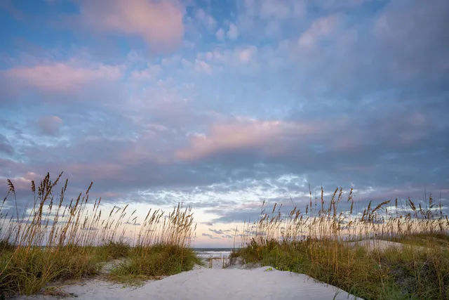 a view of a street with a building and a street