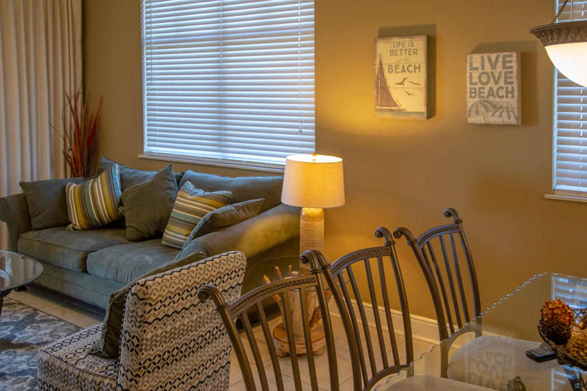 1150 Santa Rosa Boulevard, Unit 223 Fort Walton Beach, FL 32548 - Photo 14 of 35 a living room with furniture and a window