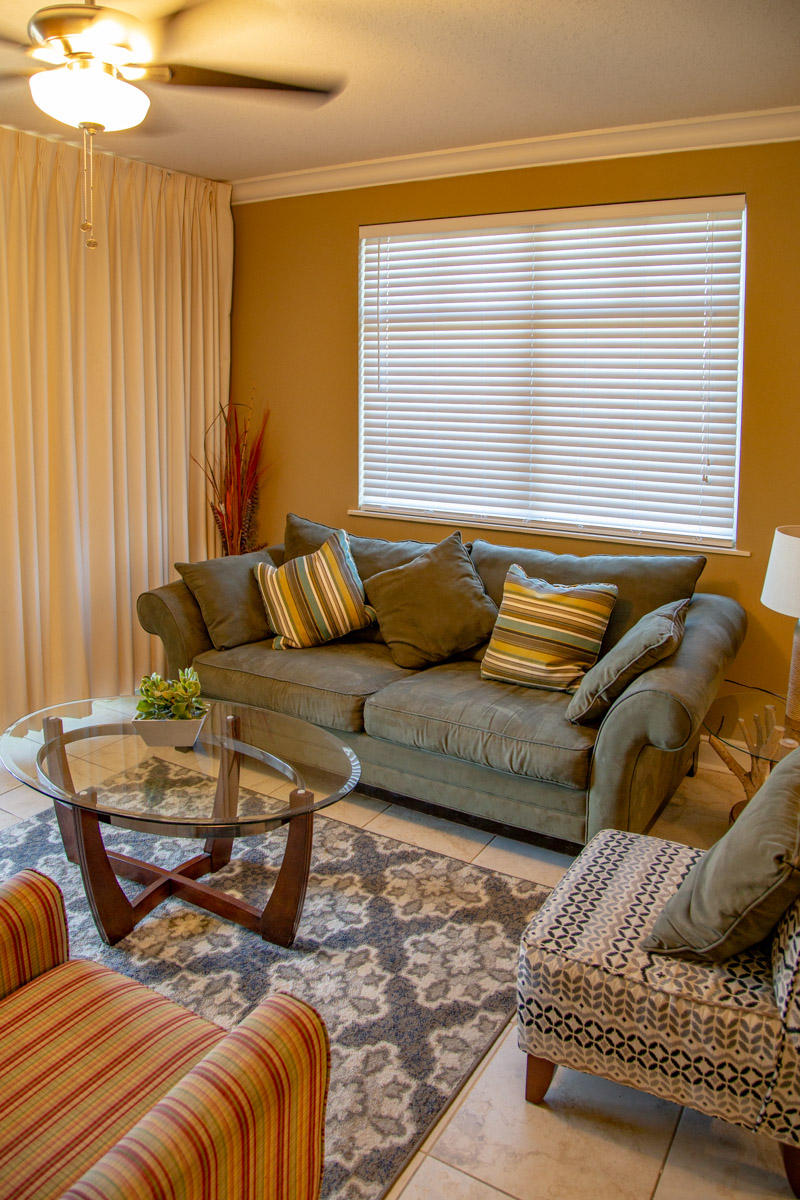1150 Santa Rosa Boulevard, Unit 223 Fort Walton Beach, FL 32548 - Photo 15 of 35 a living room with furniture and a couch
