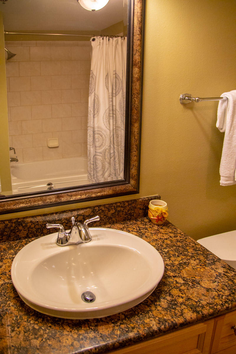1150 Santa Rosa Boulevard, Unit 223 Fort Walton Beach, FL 32548 - Photo 17 of 35 a bathroom with a sink and a mirror